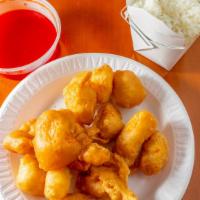 Sweet & Sour Chicken · Served with one egg roll and pork fried rice.