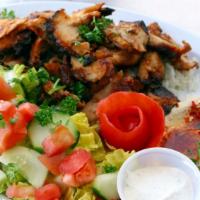 Chicken Shawerma Plate · Includes chicken shawarma (strips of spit-roasted chicken), basmati rice, hummus, pita bread...
