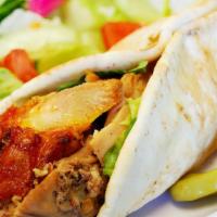 Chicken Shawerma Wrap · Traditional Mediterranean chicken, grilled along searing hot spit, served with our tahini or...