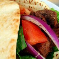 Beef Shawerma Wrap · Slowly oven roasted and thinly sliced beef, lightly spiced and oh so tender.