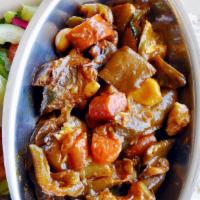 Veggie Stew · A hearty melange of eggplant, zucchini, carrots, peppers, and potatoes in a rich tomato base...
