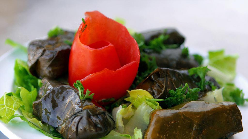 Grape Leaves · Four piece, hand rolled, stuffed with rice, tomatoes, parsley, onions and spices.