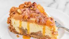 Apple Caramel Cheesecake  · Graham cracker crust topped with caramel cheesecake and apple cubes then finished with a uni...