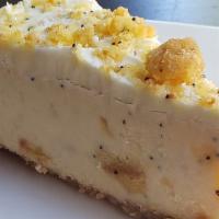 Lemon Poppyseed Cheesecake  · Light and fluffy lemon poppyseed bread mixed with cream cheese on a graham cracker crust top...