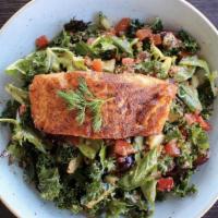 Blackened Salmon Salad · Blackened salmon, kale, mixed greens, quinoa, red bell pepper, tomato, cucumber, sliced grap...