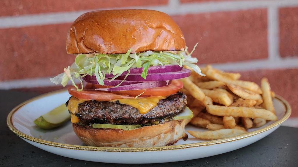 All American Burger · shredded lettuce, tomato, red onion, pickle, cheddar cheese, thousand island, sweet pickled relish, toasted bun