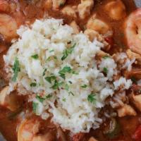 Gumbo · chicken, jumbo shrimp, andouille sausage, traditional dark roux, white rice, fried okra