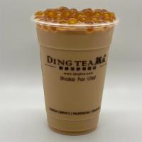 Signature Milk Tea Slush · Includes one topping. Non-dairy.