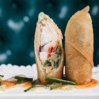 Crispy Lobster Spring Roll · lobster tail, red & green cabbage, fresno peppers, cilantro, basil, kaffir lime aioli, chili...