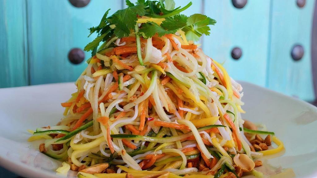 Crab Mango Noodle Salad · fresh jumbo lump crab, rice noodles, papaya, mango, cucumber, rainbow carrot, cilantro, nouc cham
