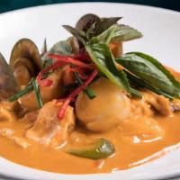 Seafood Thai Curry · wild halibut, sea bass, salmon, prawns, scallops & regional mussels, spicy coconut red curry...