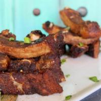 Cantonese Coastal Dry Ribs, Half Rack (Dd) · all natural Duroc Family Farms pork ribs, dry rubbed & cooked in house 7 spice, with spicy a...