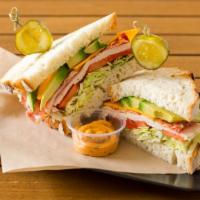 Paden'S Special Turkey · Boar's Head Ovengold Turkey, Bacon, and Vermont Cheddar with spring mix, tomato, and avocado...