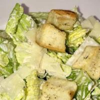 Caesar Salad · Romaine lettuce, shaved Parmesan, house-made croutons and Caesar dressing.