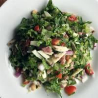 Italian Chopped Salad · chopped romaine lettuce, Italian salami, provolone cheese, garbanzo beans, fresh mushrooms, ...
