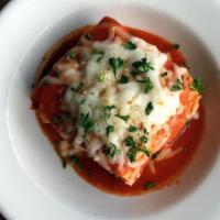 Lasagna · ground beef, ricotta cheese, marinara sauce and melted mozzarella