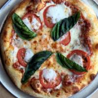 Margherita · tomato, fresh mozzarella and basil