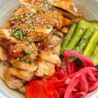 Chicken Teriyaki Bowl · rice, chicken, assorted pickled vegetables, chives, and teriyaki sauce.