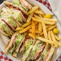 Club Sandwich Combo · Sandwich: mayo, lettuce, tomato, bacon, turkey and cheese...cut in four pieces, with side of...