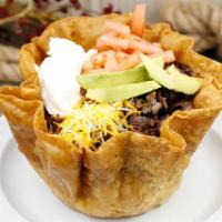 Taco Salad · fresh flour tortilla bowl
inside: beans, lettuce, tomato, sprinkled cheddar cheese your choi...