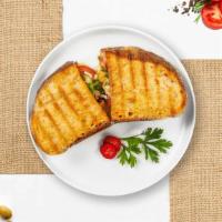 Chicken Chipotle Panini · Chicken with chipotle served on toasted bread.