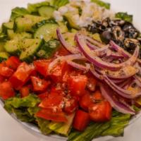 Greek Salad · Romaine lettuce, cucumber, red onion, tomato, black olives, feta cheese.