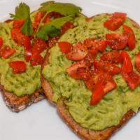 Avocado Toast · Avocado, cherry tomatoes, fresh coriander, olive oil, salt pepper.