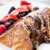 Brioche French Toast · With Fresh Seasonal Berries & Confectioner's Sugar, with Sweet Butter & Pure Maple Syrup