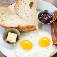 Two Egg Breakfast · With Niman Ranch Applewood Smoked Bacon or Chicken Apple Sausage & Toast