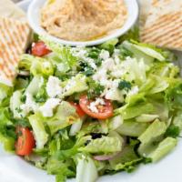 Greek Salad · Chopped Romaine, Parsley, Mint, Tomatoes, Feta Cheese, Persian Cucumbers, Kalamata Olives, R...