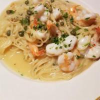 Shrimp Scampi · Sautéed shrimp and linguini pasta tossed with lemon, caper, parsley, oregano, chili flakes, ...