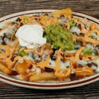 Mexi Fries · French Fries topped with Asada or Chile Verde, Monterey Jack cheese, guacamole, sour cream, ...