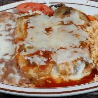 Chile Rellenos · Two egg battered California long chile peppers stuffed with Monterey Jack cheese and topped ...