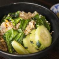 Salted Fish Fried Rice · Jasmine rice, stir-fried with scallions, garlic, and Chinese broccoli and egg.
