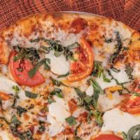 Margherita Pizza · Marinara, mozzarella, fresh mozzarella, basil, garlic herb fusion.