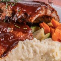 Beef Baby Back Ribs Full Rack - Dinner · Beef Ribs
 Full Rack      
Dry rubbed pork ribs glazed with BBQ sauce
