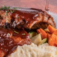 Beef Baby Back Ribs Half Rack - Dinner · Dry rubbed pork ribs glazed with BBQ sauce