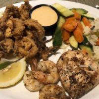 Fisherman Plate · Lemon caper sauce, rice pilaf, vegetables
