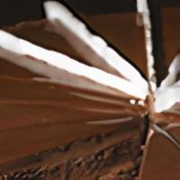 Chocolate Fondant  · Chocolate layer cake filled with a rich chocolate cream, covered with chocolate ganache and ...