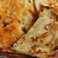 Himalayan Yak & Yeti Special Naan · Naan bread stuffed with cashew, almonds, raisins and shredded coconut.