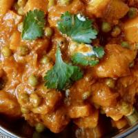 Aloo & Kerau (Green Peas & Potato) · Potatoes & Green peas cooked with onion & tomato sauce with Himalayan spices.