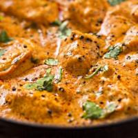 Chicken Tikka Masala · Marinated boneless chicken cubes baked in clay oven and then cooked in creamy onion & tomato...