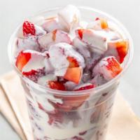 Strawberries With Cream · Chopped strawberries with house sweet cream and granola.