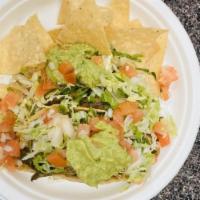 Veggie Taco · Lettuce, guacamole and pico de gallo.
