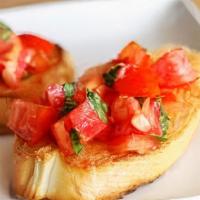 Bruschetta · Our housemade bread, diced tomatoes, garlic, onion, basil, romano and olive oil.
