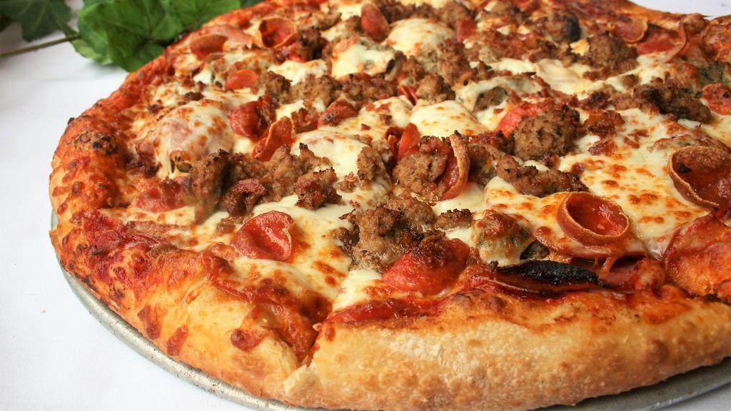Meat Lovers Pizza · All meat - pepperoni, sausage, salami, ham, Canadian bacon, meatballs and applewood smoked bacon topped with mozzarella.