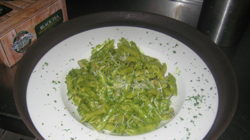 Gf Penne Pesto Chicken · Our Penne Pesto chicken tossed with GF penne noodles and pine nuts.