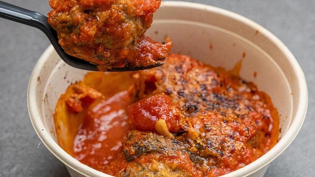 Danny Boy'S Famous Meatballs · 4 juicy beef and pork meatballs with slow cooked tomato sauce