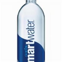 Water · 700 ml smart water in a clear plastic bottle