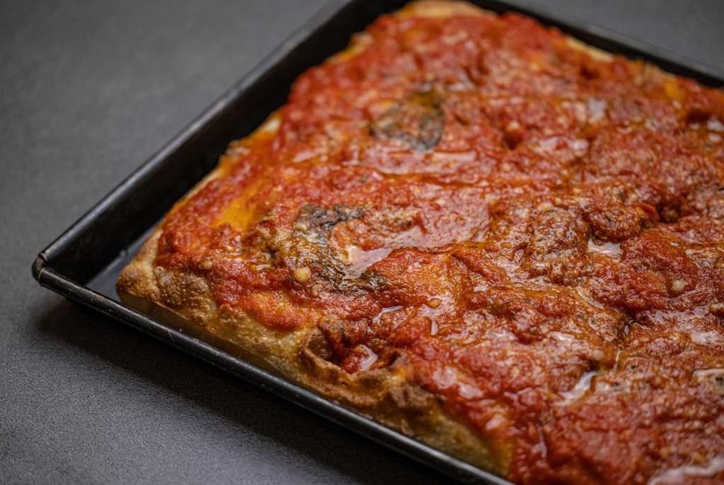 Sicilian Red · Sicilian style square slice thick crust with roasted tomato sauce (PIE DOES NOT COME WITH CHEESE UNLESS YOU ADD IT) (serves 3-4 people)